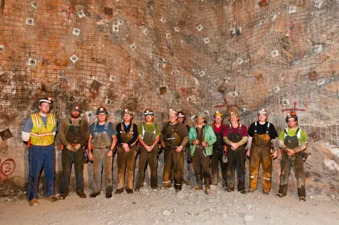 Group of construction workers in an underground drift