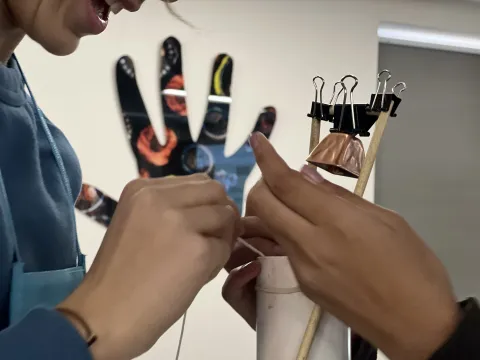 NationsClassroom students had fun building a working model of a hoist during a hands-on STEM learning activity at SURF.
