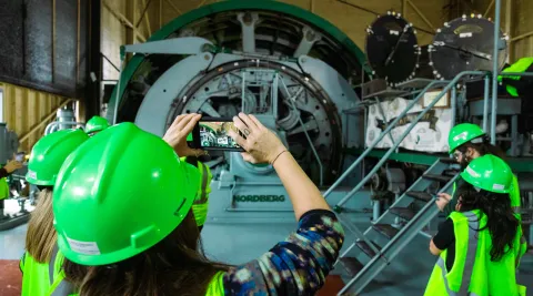 A tourist takes a photo of the Yates Hoist.