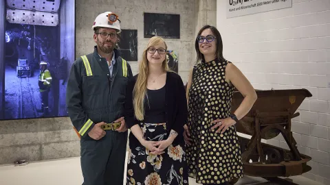   UZH physics professor Björn Penning (left) is joined by exhibit curator Melanie Widmer, and artist Gina Gibson at the UZH Science Pavilion.   