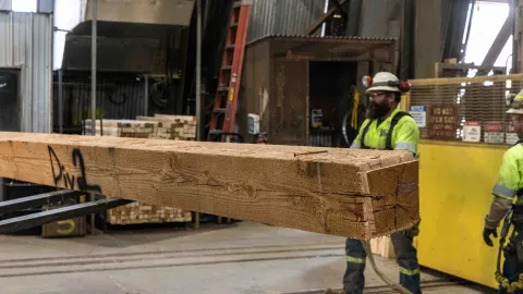 Moving a timber inside the Yates Shaft. 
