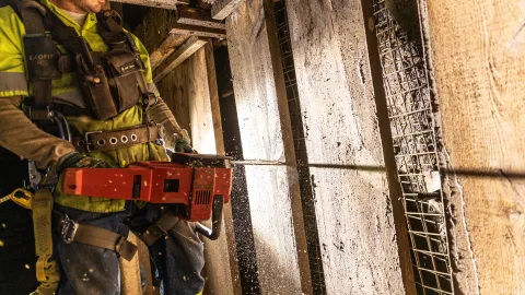Cutting out old timber inside the Yates Shaft