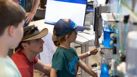 Experimenting with a water exhibit.