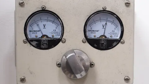 Steel enclosure, meters, knob, brass, electronics, uncertainty