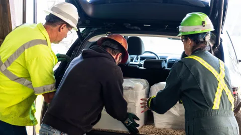 Loading ultra pure copper into a car at the top of the Yates shaft.
