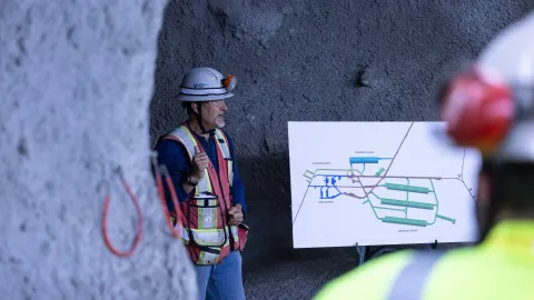 A tour guide, Brent Knottnerus, a project engineer for SURF, speaks during the visit. 