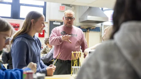 Chad Ronish teaching a high school class.