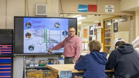 Chad Ronish teaching a high school class 